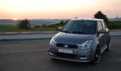 L�kkert at st� p� en top ved solnedgang..